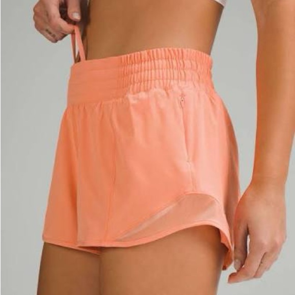 Lululemon Hotty Hot High-Rise Lined Short 2.5" in coral kiss, size 8